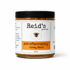Jar of Reid's Gourmet anti-inflammatory honey blend on a white background