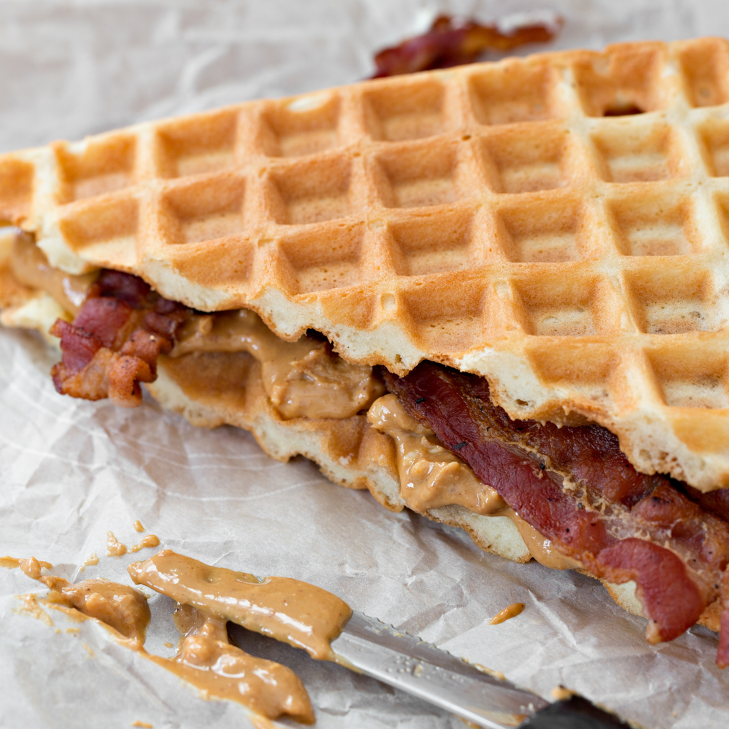 Waffles with peanut butter and bacon