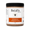 Jar of Reid's Gourmet cinnamon whipped honey on a white background