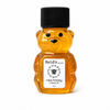 Honey bear bottle with Reid's Gourmet label on a white background