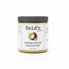 Jar of Reid's Gourmet toasted coconut peanut butter on a white background