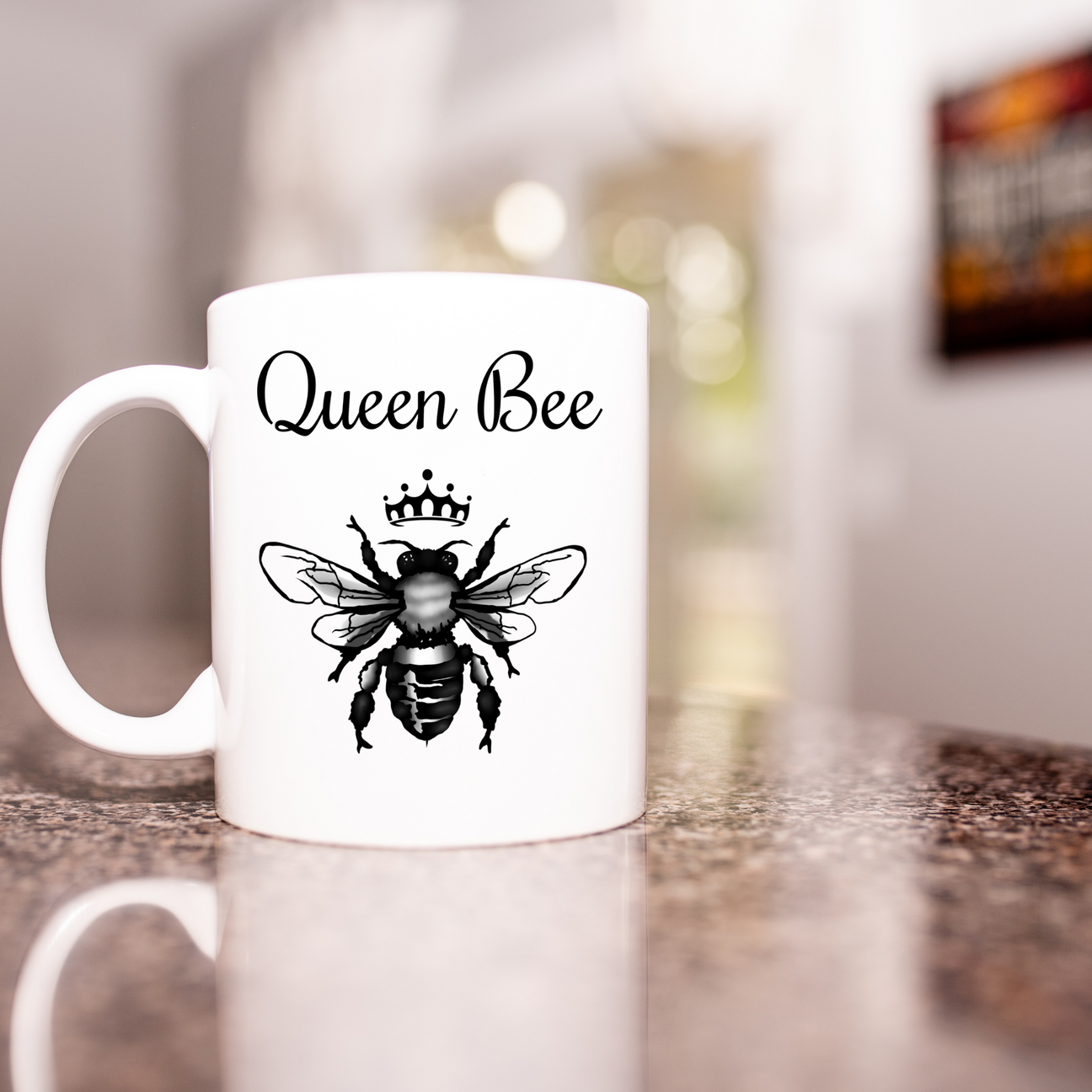 Mug that says queen bee with a crown above a honey bee